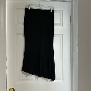 Pretty mid-length partially sheer skirt. Used once!
